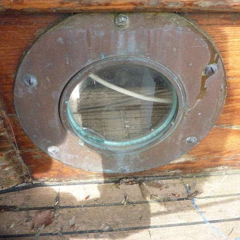 The Portholes were fitted before the coaming.