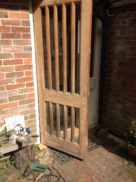 The front door after stripping and sanding
