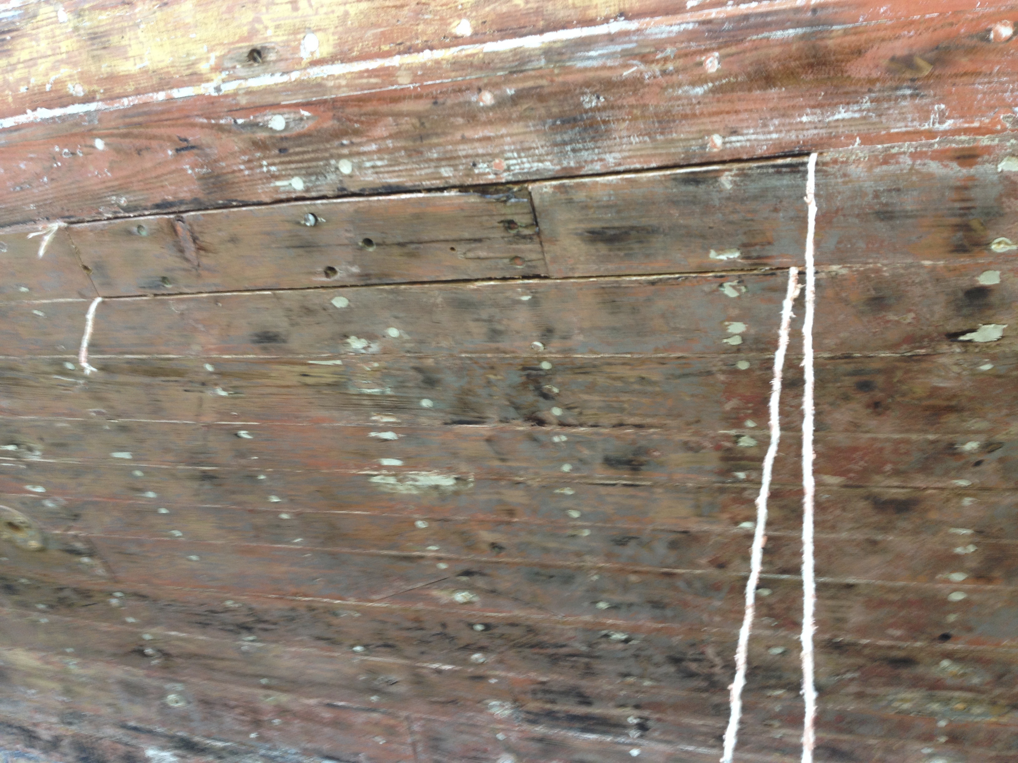 Pulling out the cotton caulking.