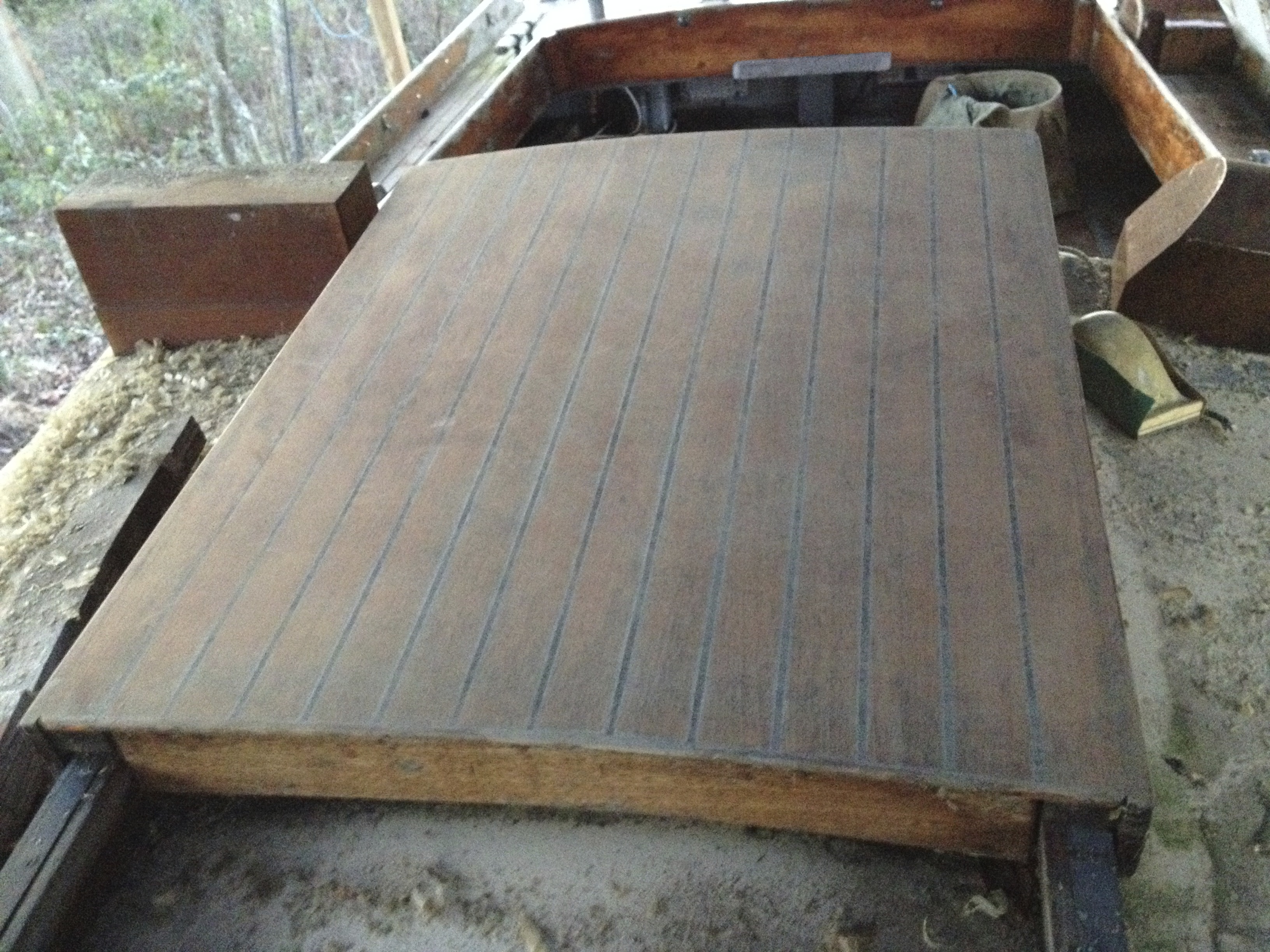 Old varnish removed from the hatch.