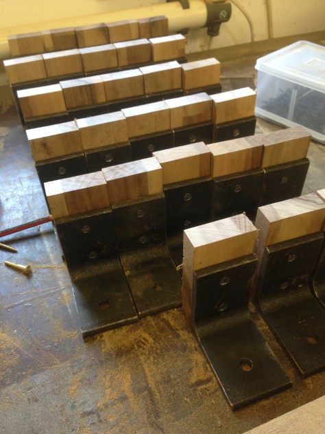 Screwed onto the steel angles